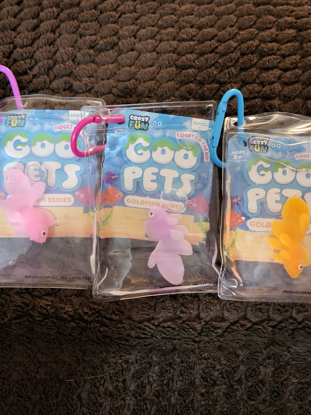 Goo Pets Goldfish Series Soft Squeeze Toy - Pink, Purple, Orange.
